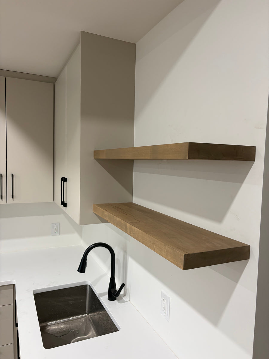 White oak floating shelves in a customer's home